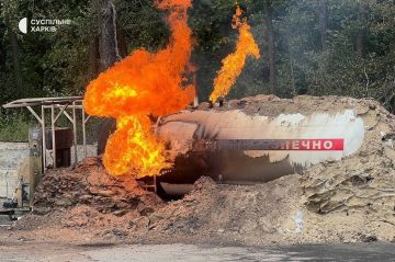 Харьков. На кадрах уничтоженные газовая установка и фура, а также сама АЗС